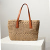 Braided straw basket with sturdy leather handles Skanto