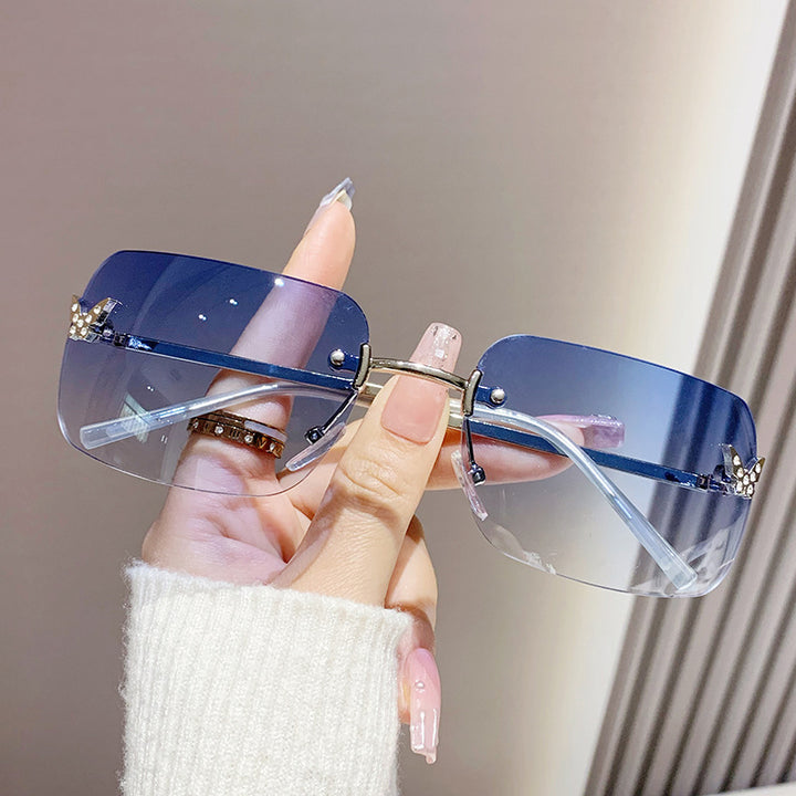 Dame elegant oversized solbriller med vevd gullramme Skanto