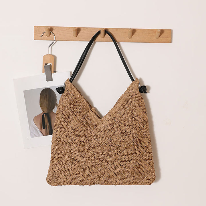 Braided shoulder bag made of natural materials Skanto