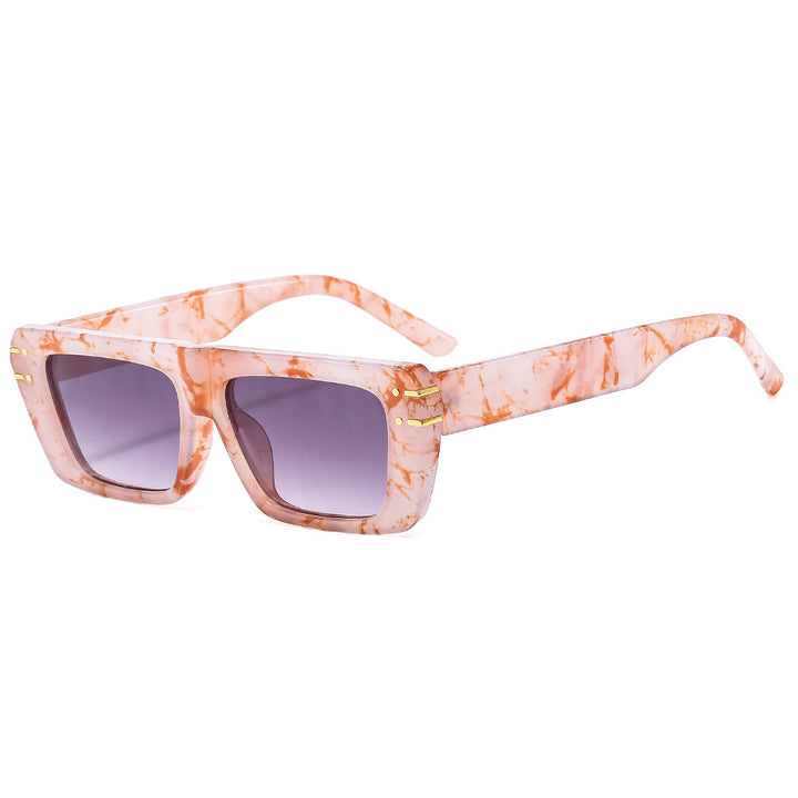 Dame moteriktig kvadratisk solbrille med glitrende akenter Skanto