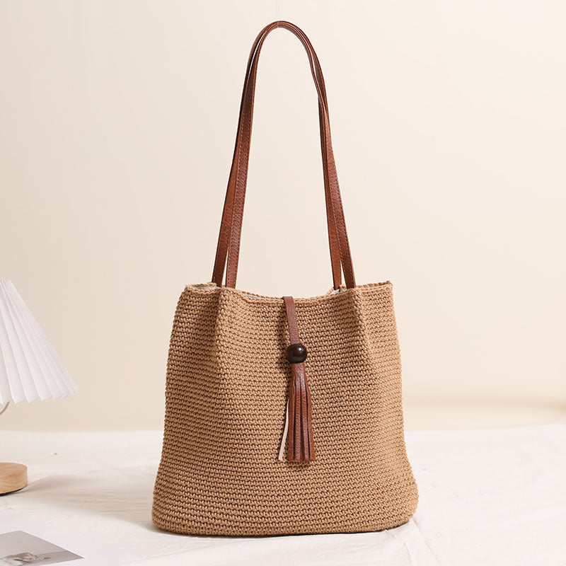Hand-crocheted crossover bag with leather details Skanto