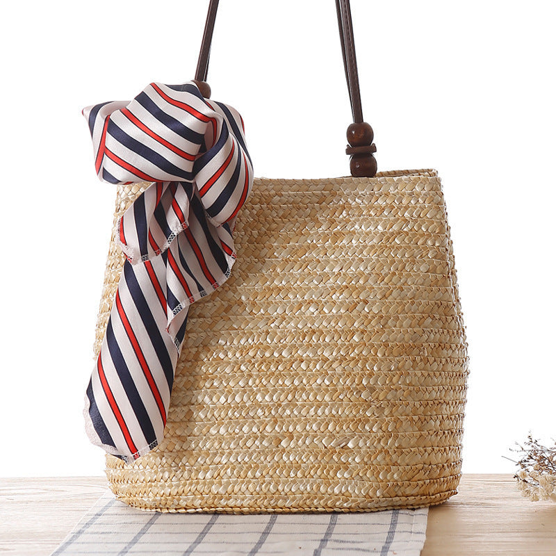 Elegant basket bag with stylish ribbon detail Skanto