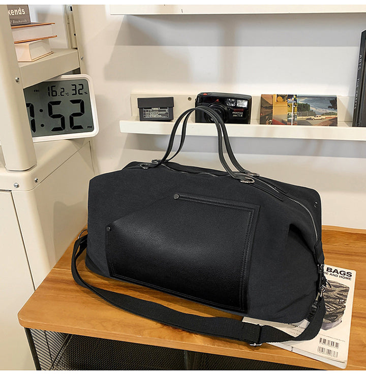 Sporty reiseveske laget av slitesterkt materiale med praktiske rom Skanto