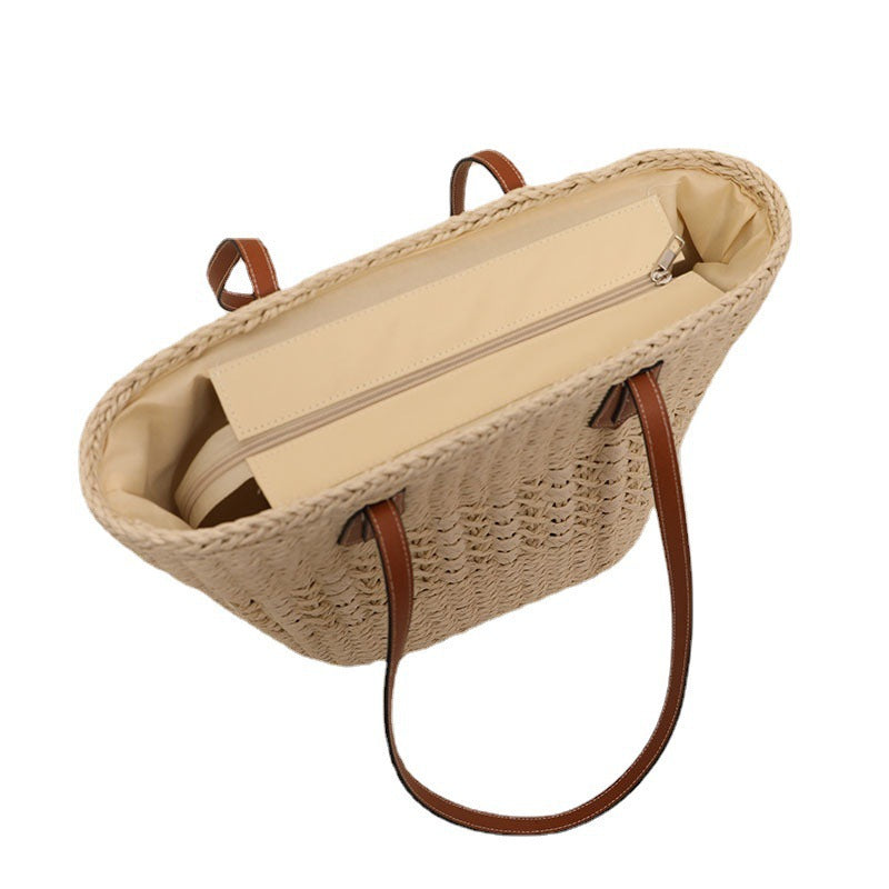 Handmade rattan basket bag with elegant leather details Skanto