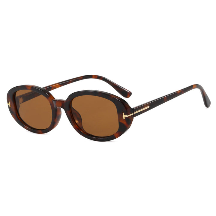 Women's stylish oval sunglasses with golden details Skanto