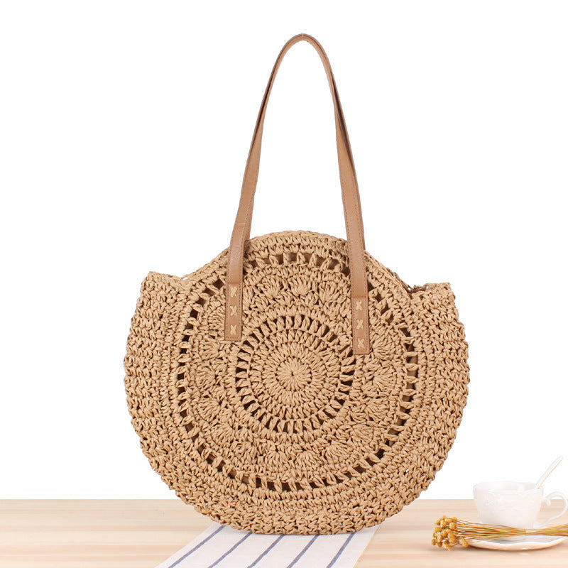 Round straw bag with leather handle Skanto