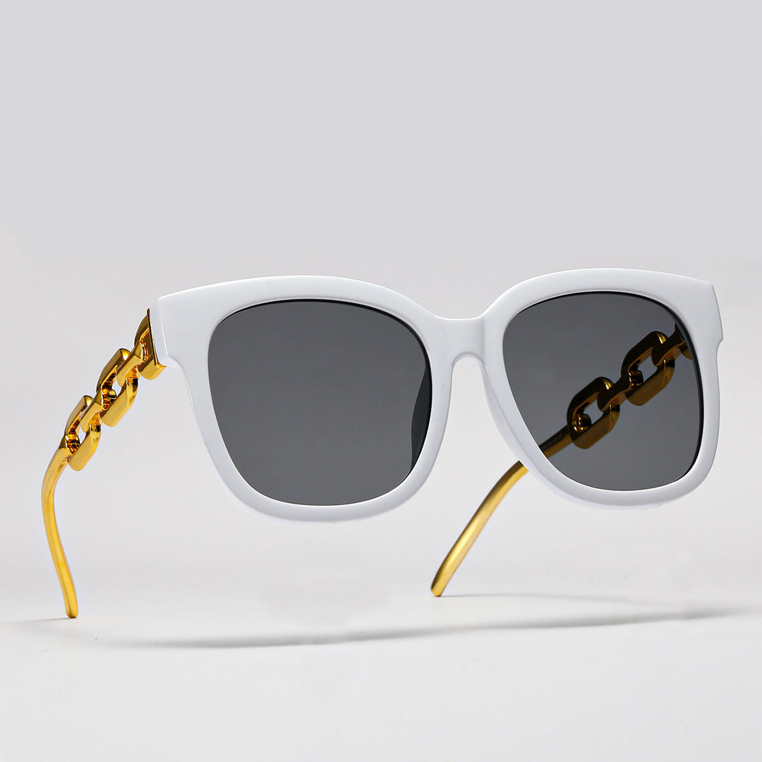 Dame moteriktig oversized solbrille med luksuriøs kjedeinnramming Skanto