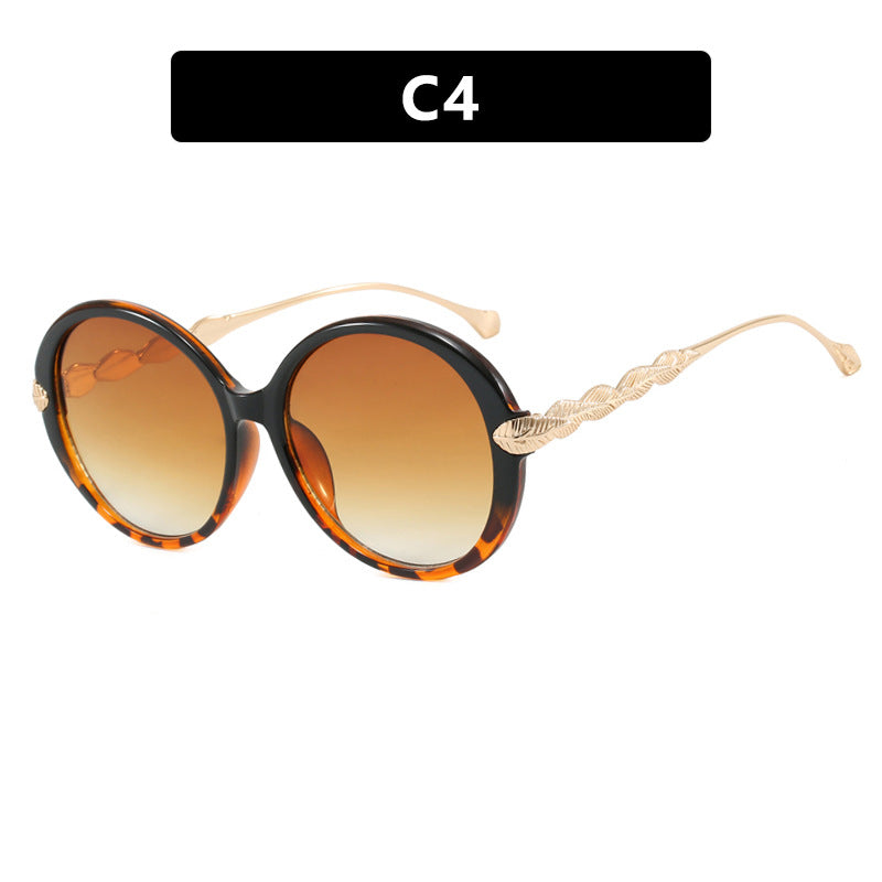 Women's large round sunglasses with decorative metal accents Skanto