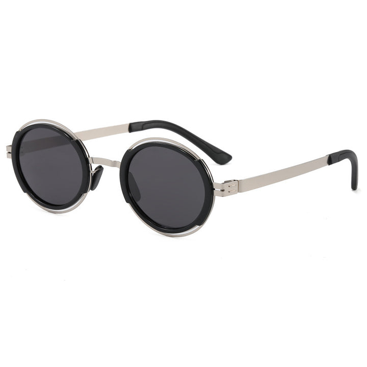 Damer moteriktig rund solbrille med elegant metallramme Skanto