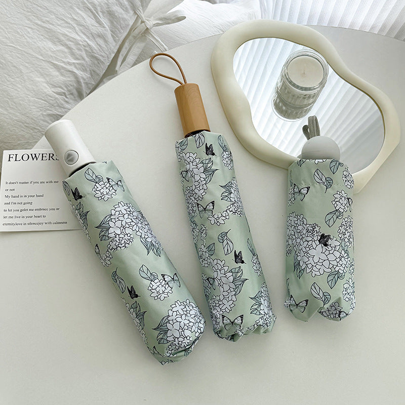 Dame Faltbar paraply med innovativt blomsterdesign Skanto