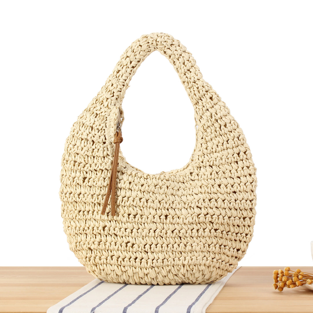 Hand-knotted shoulder bag in natural material Skanto