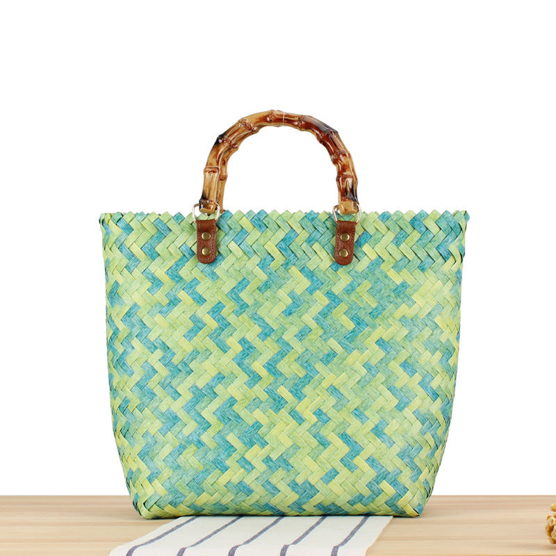 Handbag made of high-quality, braided material with bamboo handle Skanto