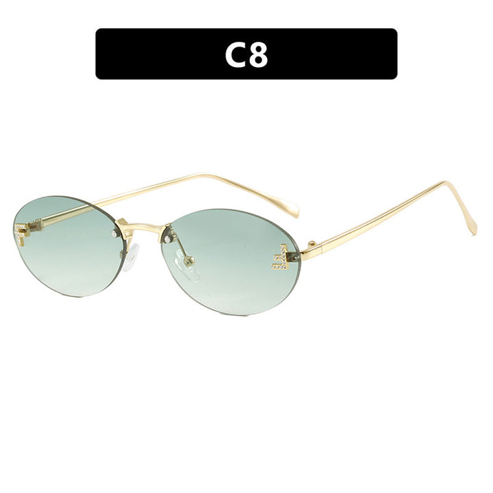 Dame mote trendy solbriller med elegante, runde glass og filigran metallramme Skanto