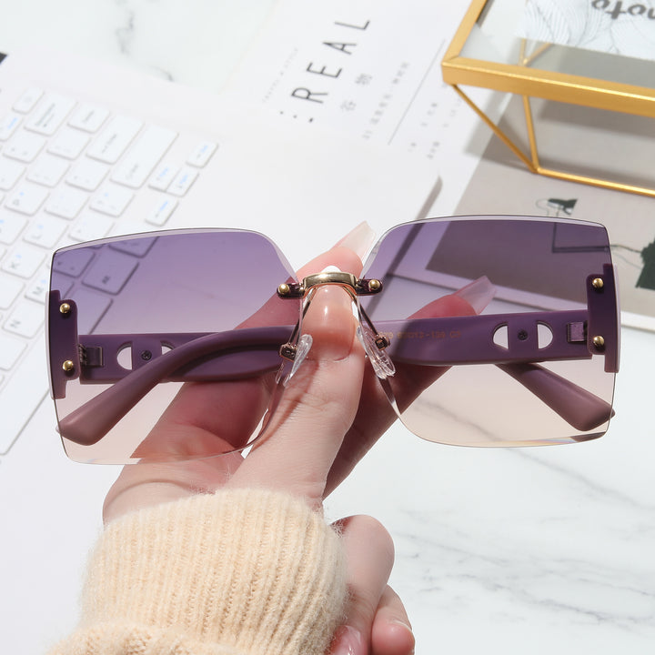 Damer Høyverdig rektangulær solbrille med stilfull metallramme Skanto