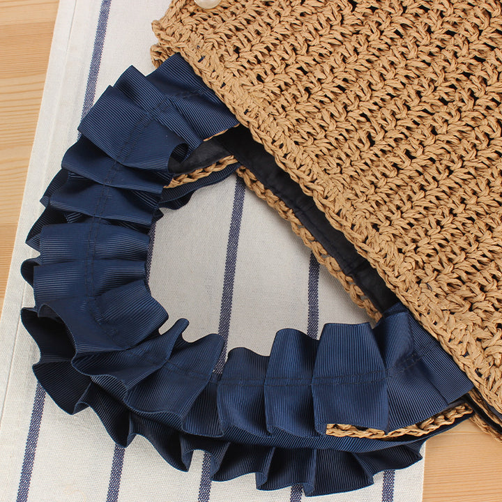 Elegant handbag with beaded decoration and ruffled handle Skanto