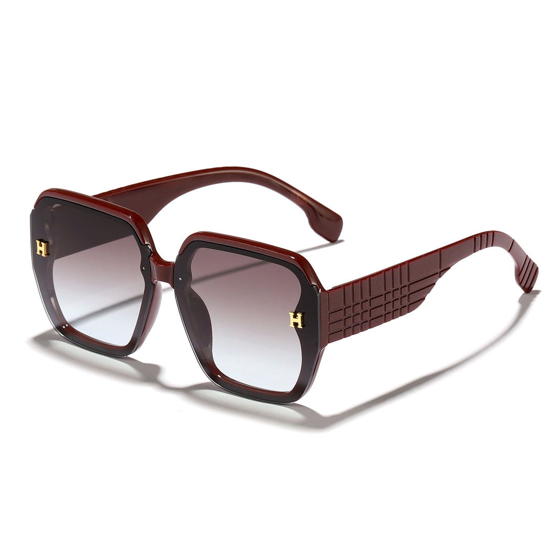 Damer moteriktig solbrille med kvadratisk ramme og trendy glass Skanto