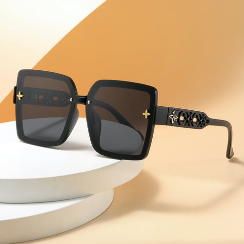 Dame design-solbriller med filigranramme og UV-beskyttelse Skanto