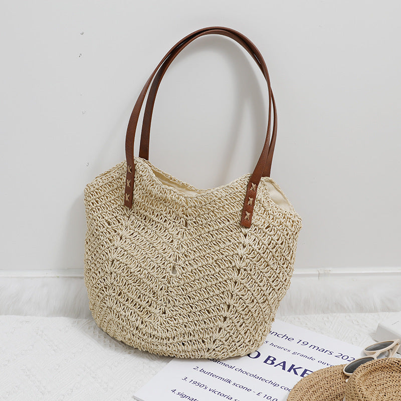 Braided basket bag with sturdy leather handles Skanto