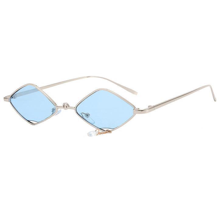 Dame moteriktig solbrille med fasettert ramme Skanto