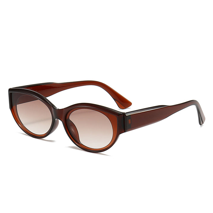 Dame Cat-Eye Solbriller med klart og moderne design Skanto