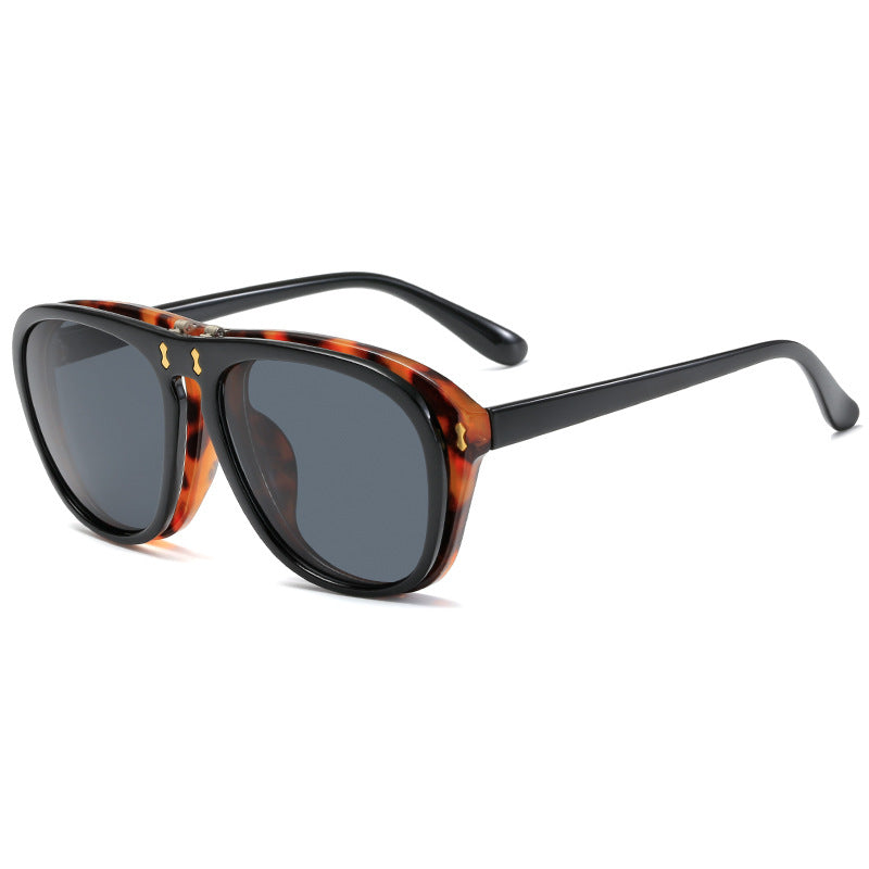 Dame moderne oversized solbrille med unik skjelldesign Skanto