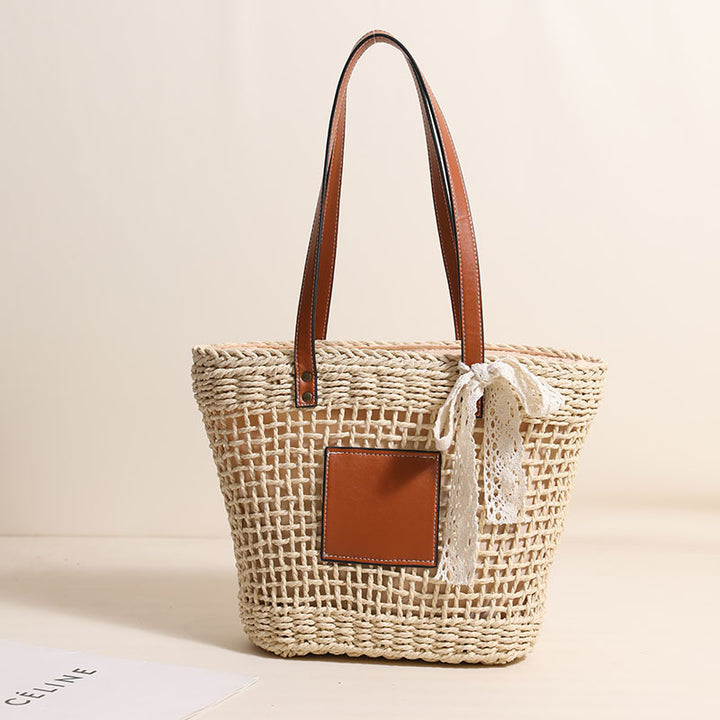 Handmade straw bag with elegant leather accents Skanto