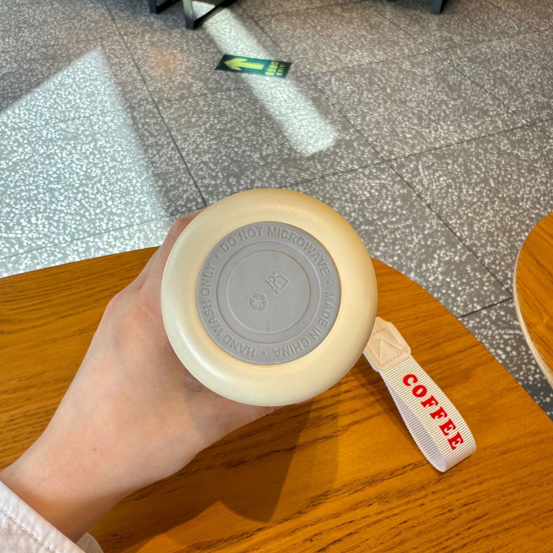 Dame isolert kaffekopp med praktisk håndholdtsløyfe Skanto