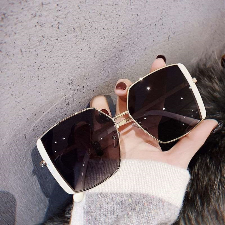 Dame trendy firkantet solbrille Skanto