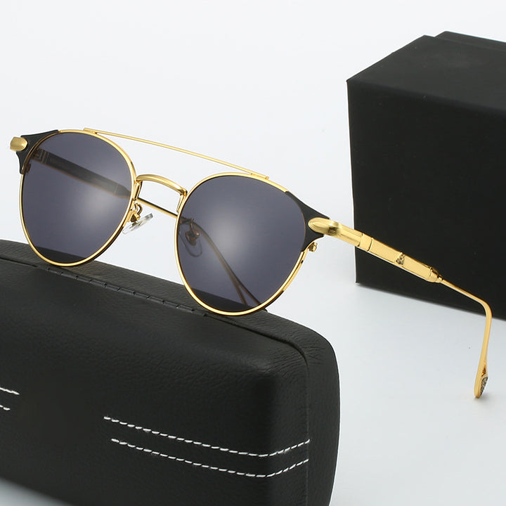 Dame rund Vintage-solbrille med høykvalitets metallramme og robust design Skanto