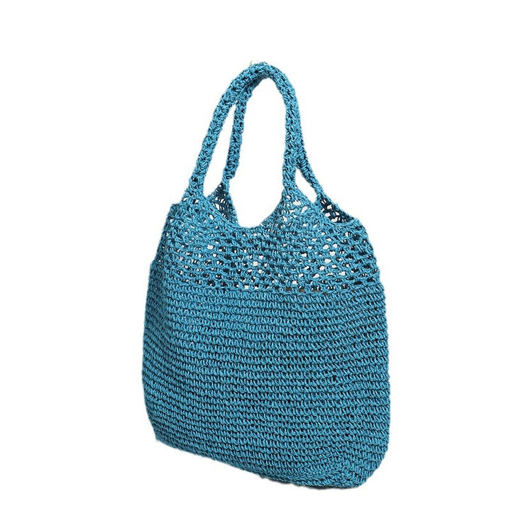 Hand-knotted raffia bag with long carrying handles Skanto