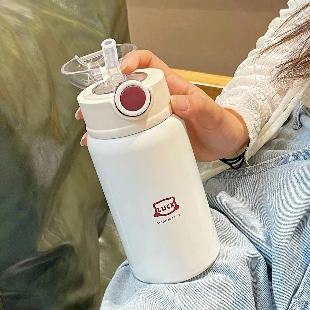Dame Wasserflasche Skanto for barn med morsomt design