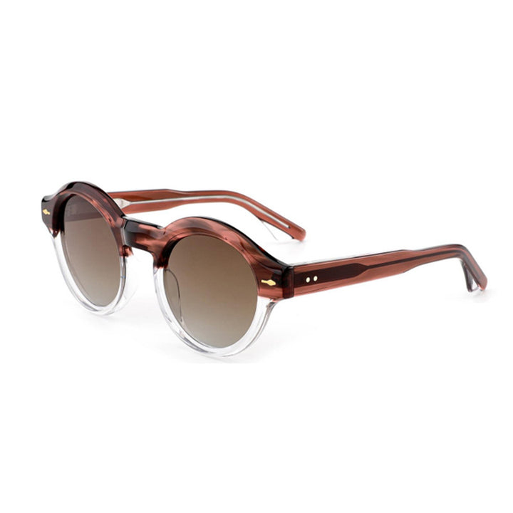 Dame solbrille i elegant retro-design med robust ramme Skanto