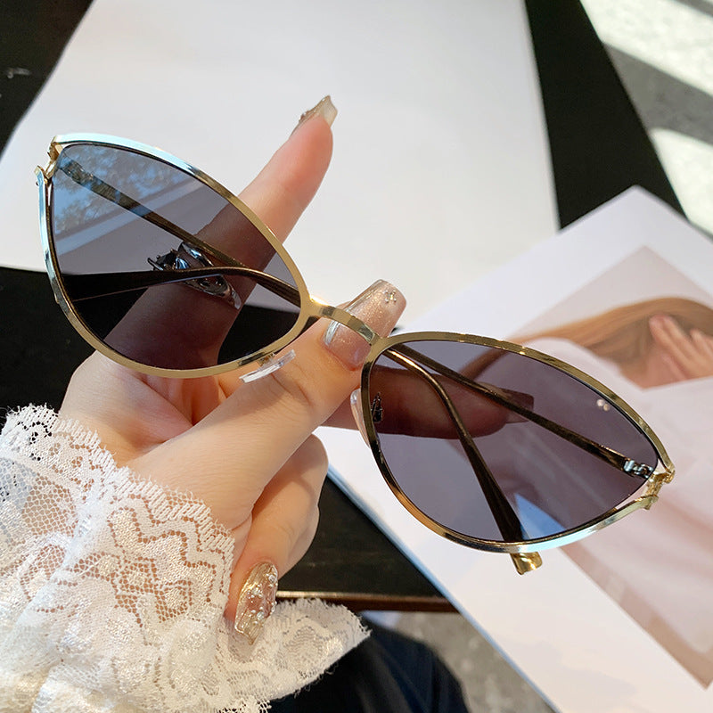 Dame Cat-Eye solbriller med elegant metallramme og UV-beskyttelse Skanto