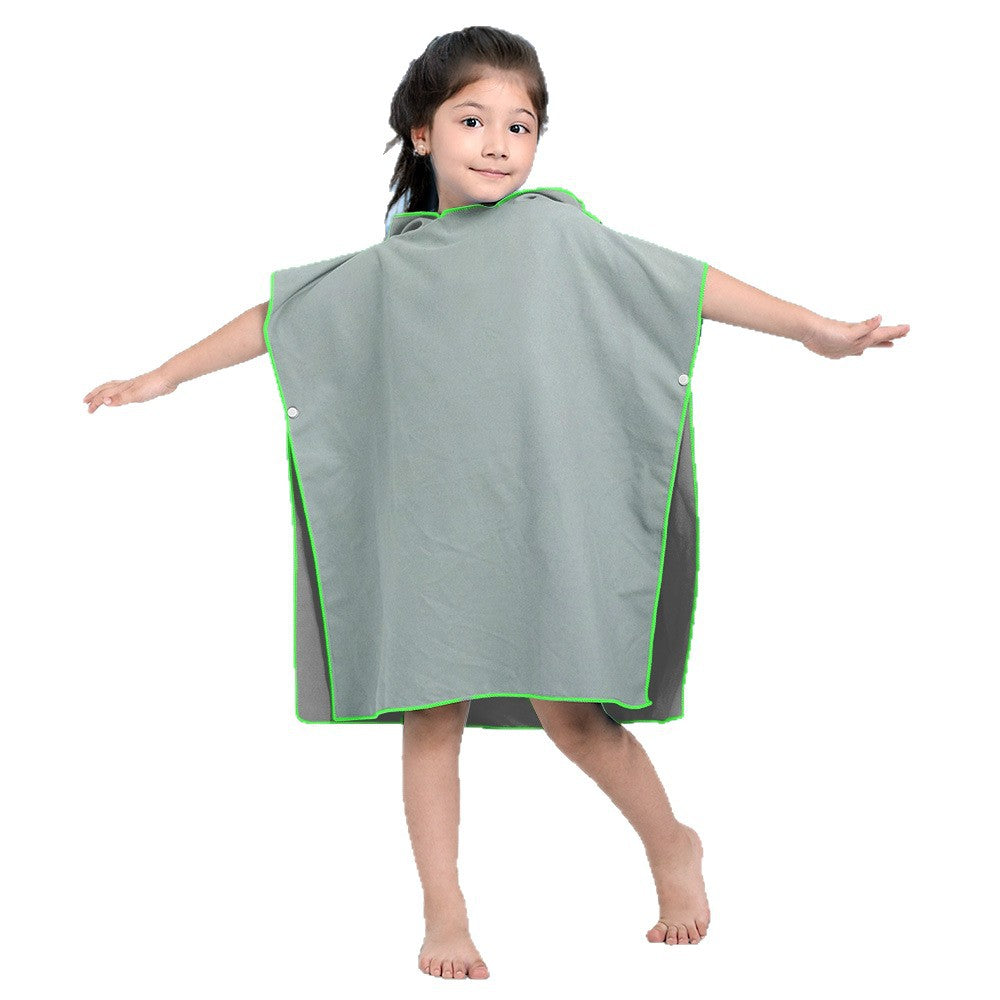 Jente badeponcho Skanto