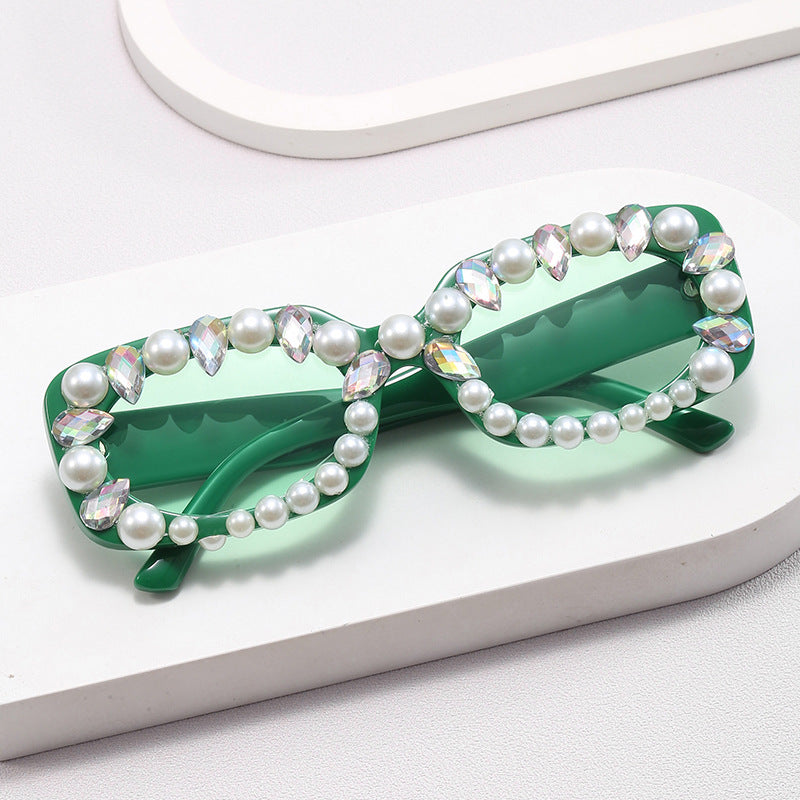 Damer elegant solbrille med perlepynt Skanto
