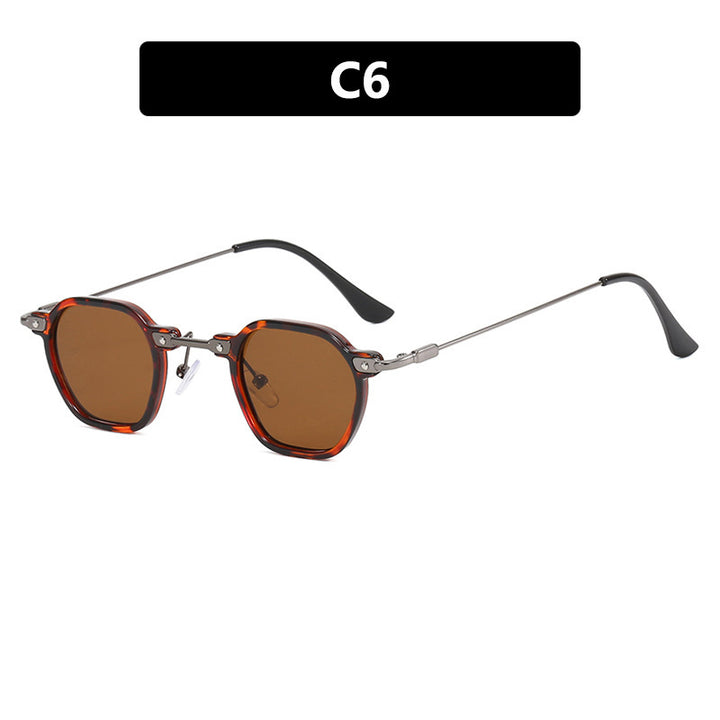 Dame moteriktig solbrille i elegant design med sekskantet ramme Skanto