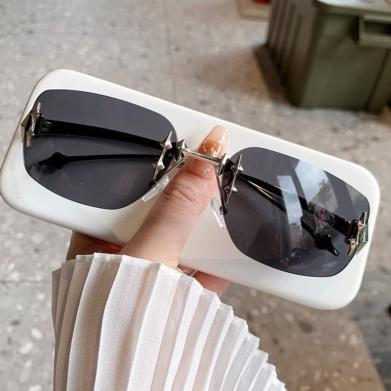 Women's designer sunglasses with ornate details Skanto