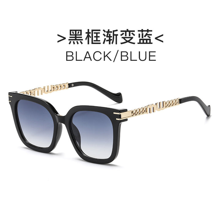 Dame designer solbrille med elegant metallramme og speilende linser Skanto