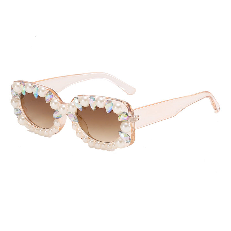 Damer elegant solbrille med perlepynt Skanto