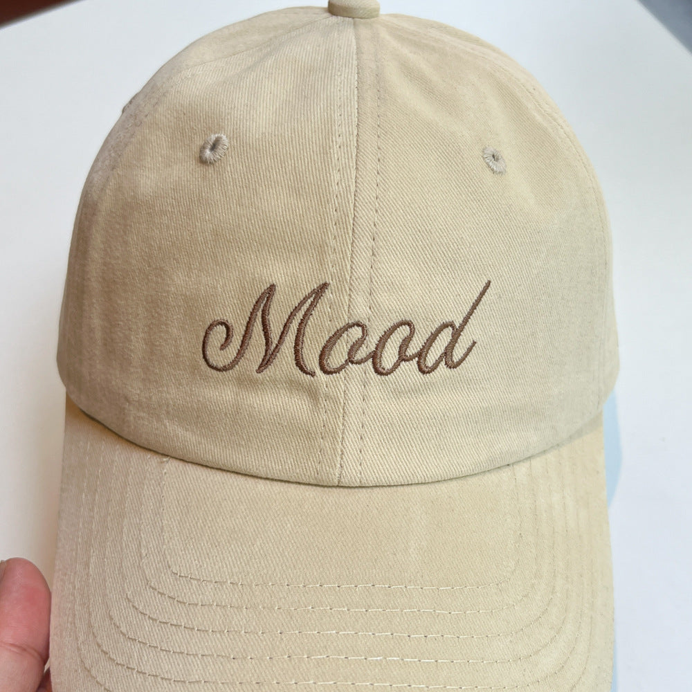 Kvinnenes broderte statement caps Skanto