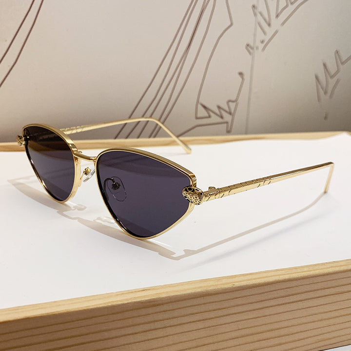 Dame designer solbrille med stilig cat-eye design og luksuriøs ramme Skanto