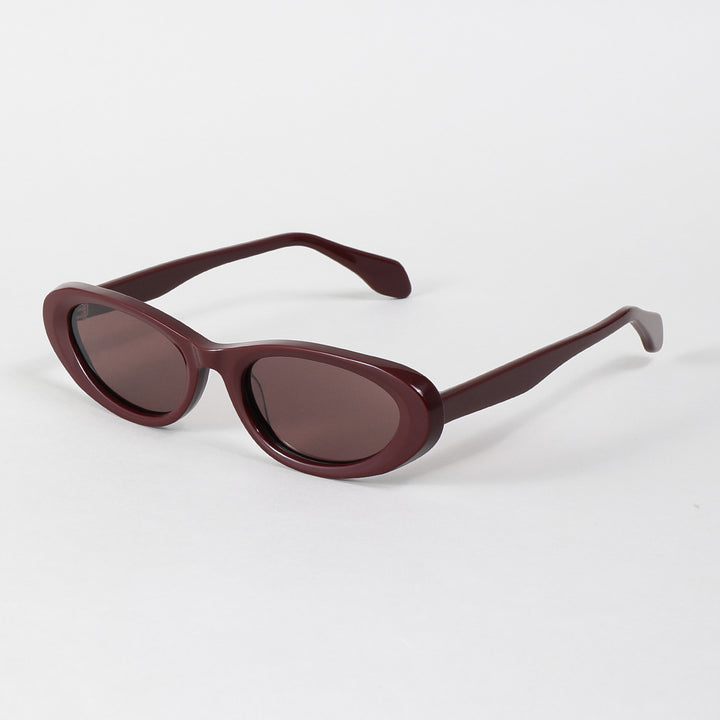 Dame designer solbriller i moderne oval design Skanto