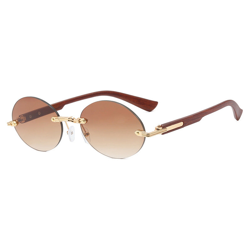Dame rund solbrille med elegant treinnramme og UV-beskyttelse Skanto