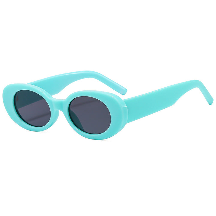 Dame modische solbrille med unik oval ramme Skanto