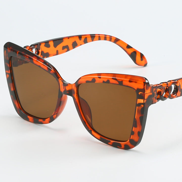 Dame moderne Cat-Eye solbriller med klar ramme og UV-beskyttelse Skanto