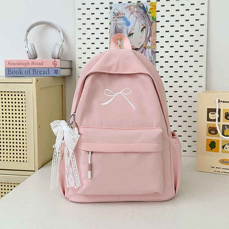 Minimalist bue-smokket skole ryggsekk