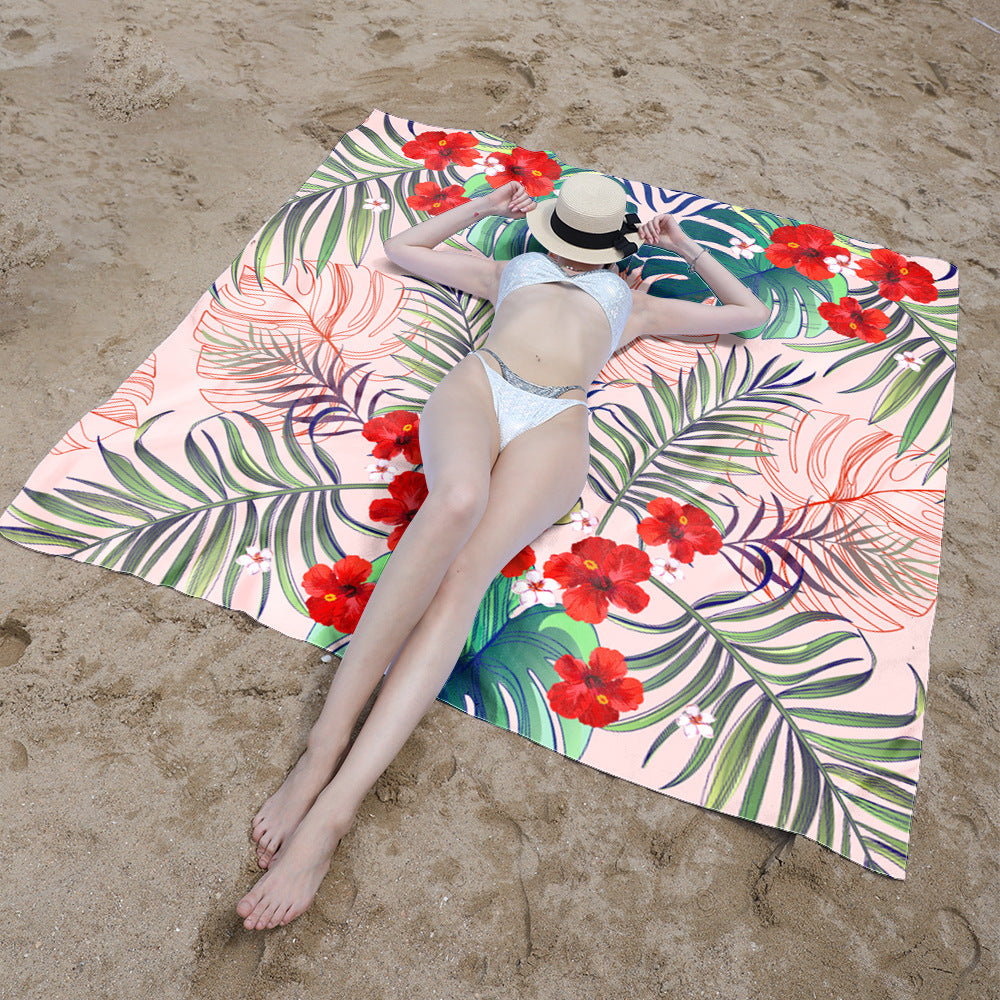 Strandteppe med livlig blomsterdesign og innovativ struktur Skanto