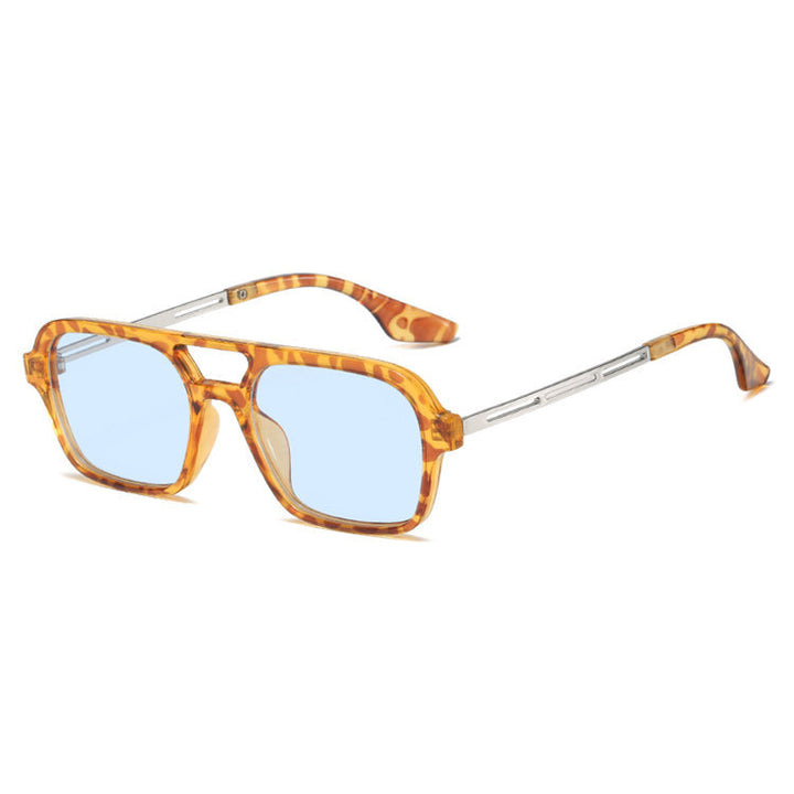 Dame designer solbrille med blå linser Skanto