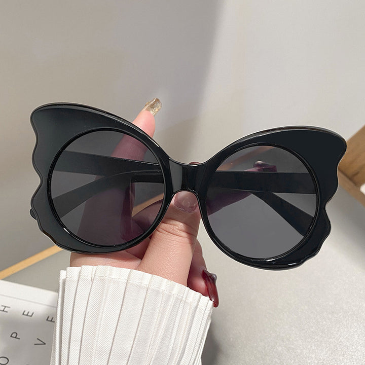 Dame Cat-Eye solbriller med unik rammeform og UV-beskyttelse Skanto
