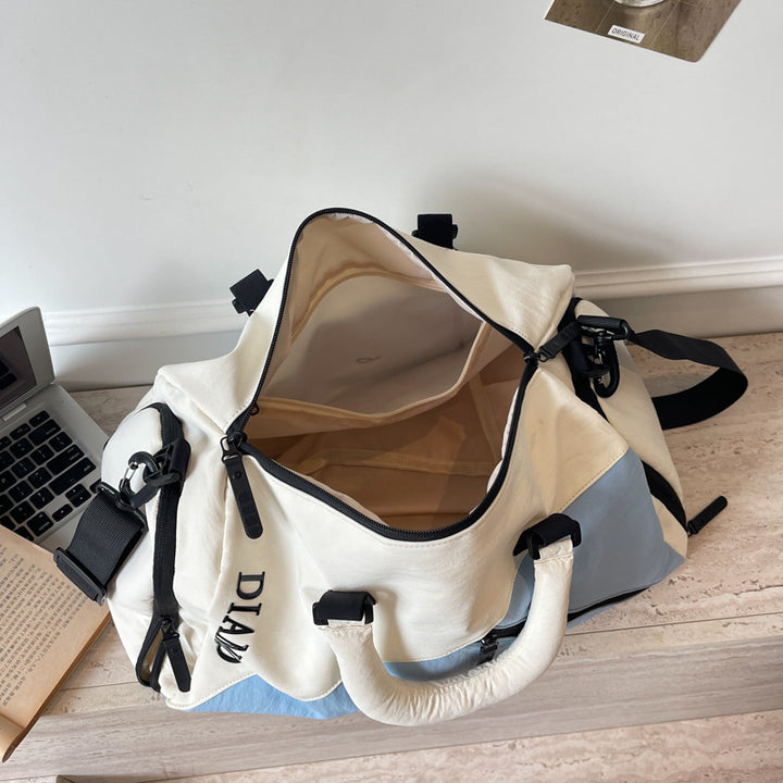 Sporty reise bag med forskjellige rom og slitesterkt materiale Skanto